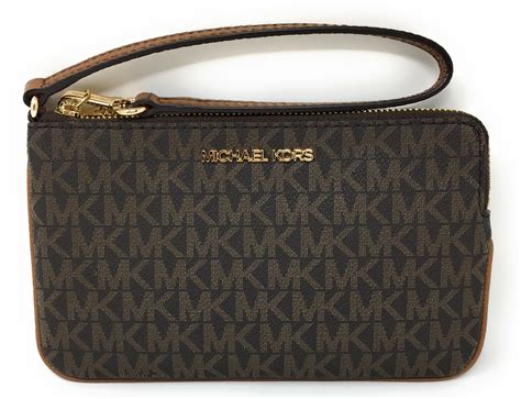 jet set michael kors wristlet|michael kors large wristlet clutch.